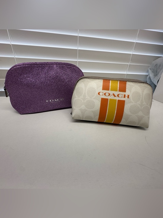 Coach Handbags - Coach Cosmetic Pouch in Cream with Orange Stripes with purple Glitter pouch